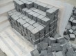 Black basalt cubes for pavement